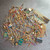 Overview of mixed gold-plated e-scrap connector pins and circuit board edge contacts.