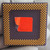 Underside pin array of AMD K6-2 processor with red label.