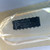 Close-up of LM339N 14-pin DIP IC chip inside blister pack.