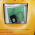 Close-up of evaluation board PCB, TL7705ACP integrated circuit, and passive components.