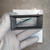Black plastic mounting bezel for C+C PM328 panel meter.