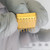 Bottom view of ELTEC AR268-0-4493 showing 14 gold through-hole pins.