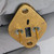 Angled view of the underside of Motorola 2N1544 transistor showing pins.