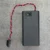 Front view of COMF SBH-321-1AS battery holder showing power switch and wire lead.