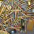 Close-up of gold-plated scrap components including connector pins and electronic headers.
