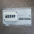 SMC SY7000-27-1T sub-base next to factory packaging bag.