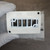 Top valve mounting surface of SMC SY7000-27-1T sub-base.