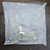 Sealed plastic bag of Saginaw 114153 mounting brackets and hardware.