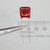 Close-up view of Digi-Key ECQ-B2223JF film capacitor showing printed markings.