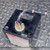 Top view of Abbott CC120D1.0 showing wiring terminals, potentiometer, and warning label.