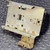 Underside of metal baseplate on Square D 8736 SB04 assembly.