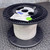 Spool of white SEA Wire and Cable M22759/32-16-9 hook-up wire standing on a metal surface.