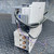 Side profile of the full ABB contactor, breaker, and terminal block subpanel assembly.