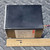 Side profile of Abbott C8D7.5 power supply next to a ruler showing length.
