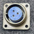 Amphenol 97-3102A-16S-6S connector mating face showing three socket contacts in blue insert.