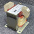 Side profile of mdexx TAM3496-0ED70-0FA0 transformer showing core stamp and secondary terminals 31 and 32.