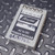 Angled view of an Acopian 28EB15 power supply module showing the top screw terminals.