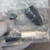 Close-up of disassembled Neutrik NC3MX male XLR connector components in packaging.