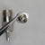 Slotted metal ferrule collar for Amphenol 83-58FCJ held in tweezers.