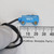 SICK WT2S-P231 sensor next to millimeter ruler.