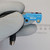 Side view of Sick WL2S-F211 sensor showing printed markings and mounting holes.