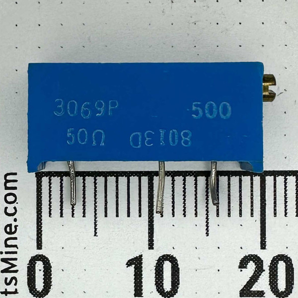 Blue 3069P trimmer printed 500 and 50 ohm beside a millimeter scale for size