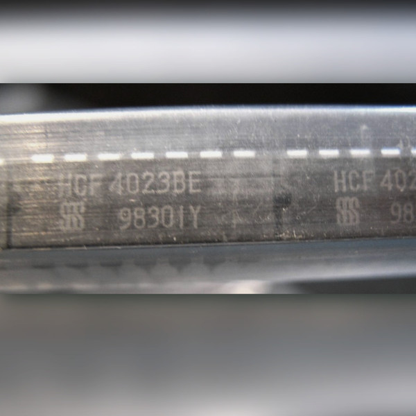 Two HCF4023BE chips end to end in a clear tube, SGS logo on each