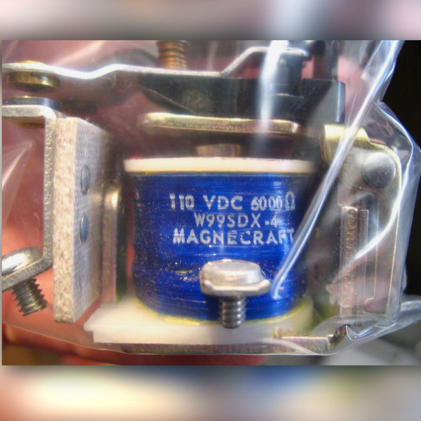 Magnecraft W99SDX-4 open-frame relay in a clear bag, blue coil marked 110 VDC 6000 ohm