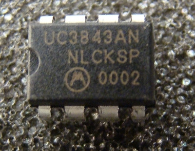 DIP-8 package marked UC3843AN / NLCKSP / 0002, Motorola logo visible, pins clean with no oxidation.