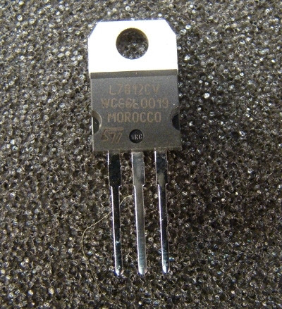 L7812CV TO-220 regulator face marked WC6680019 MOROCCO with ST logo, three straight leads