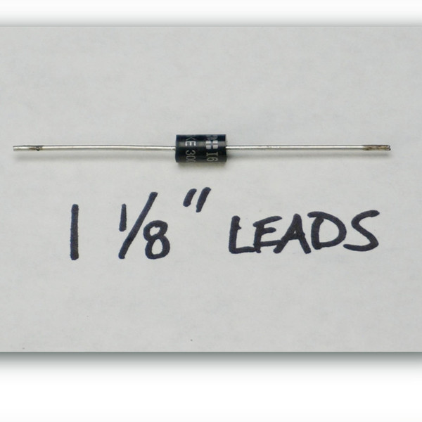Axial black-bodied TVS diode marked KE 300 beside a handwritten card reading 1 1/8 inch leads