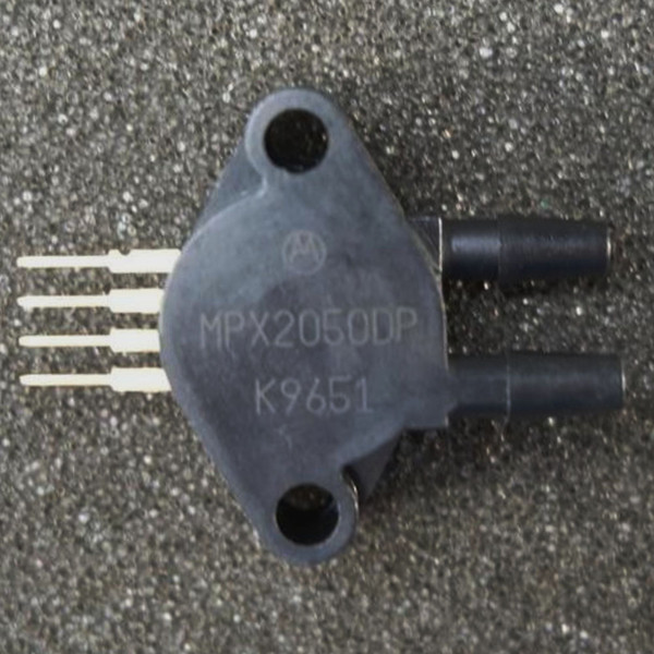 Motorola MPX2050DP pressure sensor with two side-by-side ports and four leads