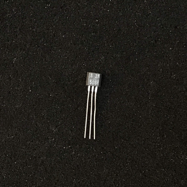 Transistor body showing "S 2N 5086" markings, leads are clean and straight with no visible corrosion.