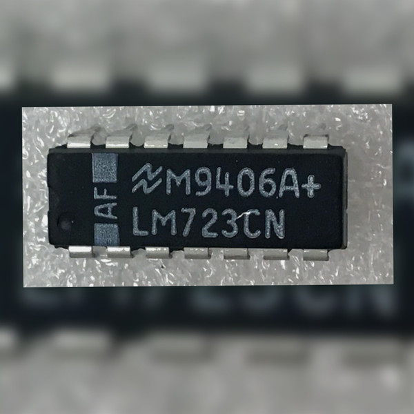 Top view of a National Semiconductor LM723CN 14-DIP voltage regulator integrated circuit.