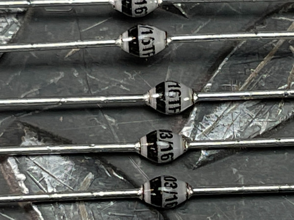 Vishay BY203-16STR rectifiers showing "16TF" and "13/16" or "03/16" markings, leads clean, no visible corrosion.