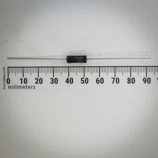 Black axial TEPRO TS1 resistor with long tinned leads beside a millimeter ruler