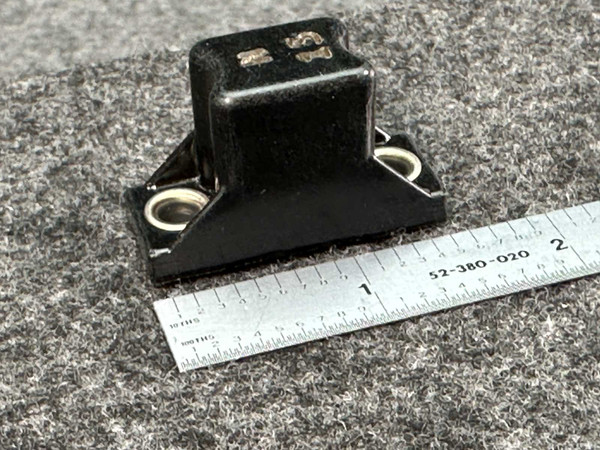 Allen-Bradley N15 Type N thermal overload heater element with a ruler for size comparison.