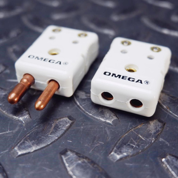 Omega NHX-U-MF standard thermocouple connector male and female pair.