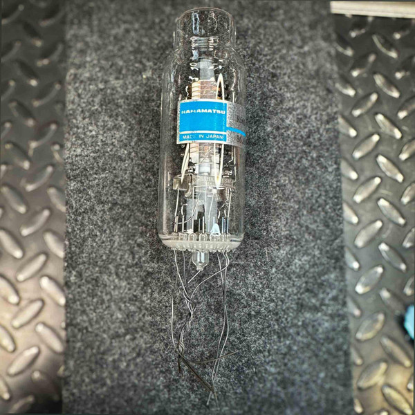 Hamamatsu R660 photomultiplier tube full view, blue label, clear glass envelope, base lead wires