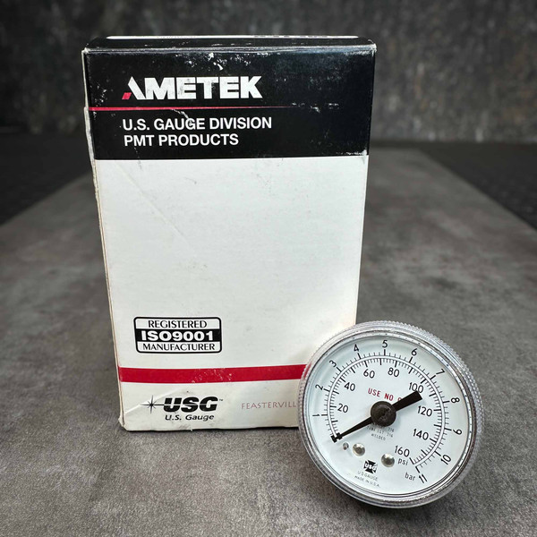 AMETEK P1535 pressure gauge standing next to its original U.S. Gauge Division box