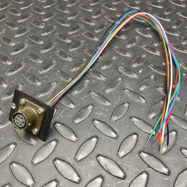 MIL-C-26482 style six-pin panelette with soldered six-wire pigtail on steel diamond plate