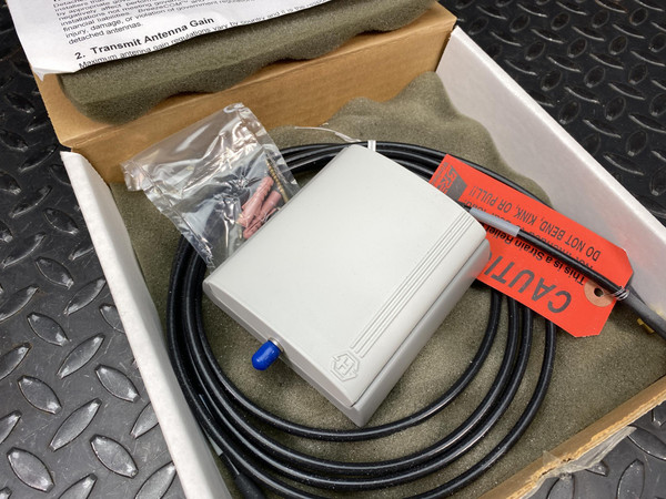 BreezeCOM Uni-8.5 antenna kit in original box with cable, hardware bag, and instructions