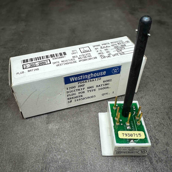 Digitrip RMS Rating Plug 1200A 60Hz from PartsMine.com with original Westinghouse box in the background.