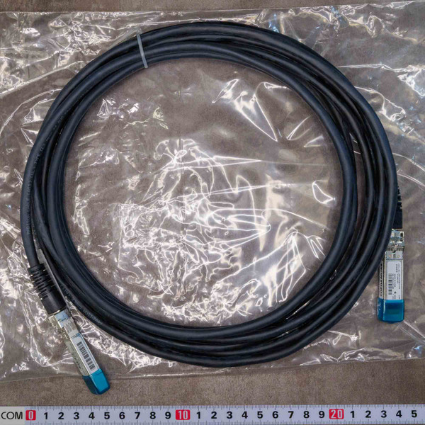 Cisco SFP+ DAC cable showing no visible wear or damage. SFP+ connectors have clear labels and blue pull tabs.