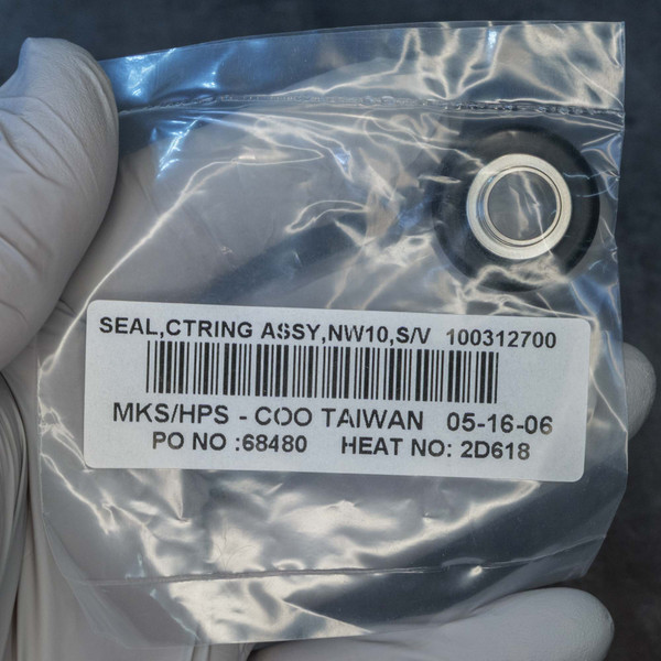 SEAL,CTRING ASSY,NW10,S/V 100312700 MKS/HPS-COO TAIWAN 05-16-06 PO NO:68480 HEAT NO: 2D618. Unit sealed in clear bag, showing no visible wear or damage.