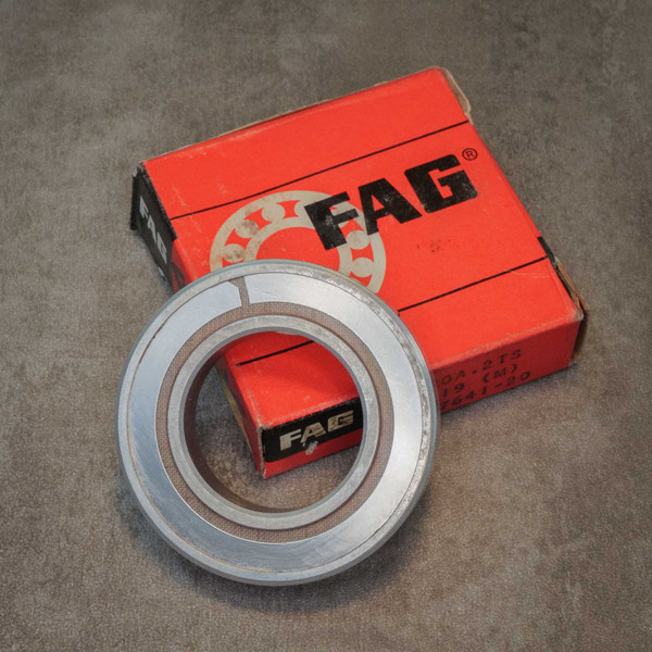 FAG bearing KP20A.2TS MS27641-20 in original box showing light surface grime on bearing, box wear.