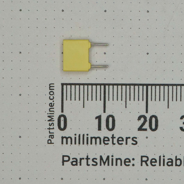 Yellow box body approx. 7mm wide; both radial leads straight and unformed. No visible body markings on this face.