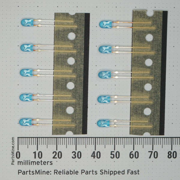 Ten oval blue LEDs on two ammo-pack carrier strips; leads show light tarnish patina; bodies intact; span approx. 75mm per ruler.