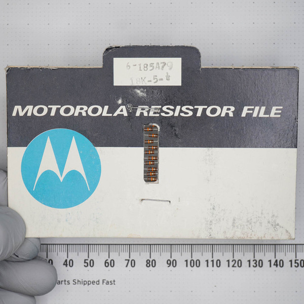 Motorola Resistor File card with handwritten label 6-185A79 and 18K-5-t on tab; 10 axial leaded resistors visible in window; card shows surface scuffs.