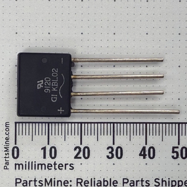 Black molded square package with four straight leads; face marked GI logo, 9120, and KBL02; plus symbol visible on lower corner; leads show light oxidation.